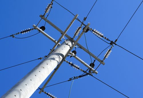 Power pole showing minimum height of power lines australia